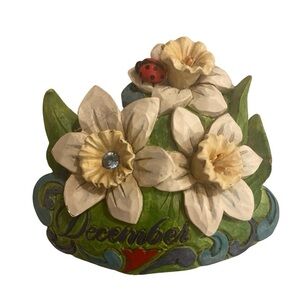 Jim Shore Flower of the Month figurine for December
